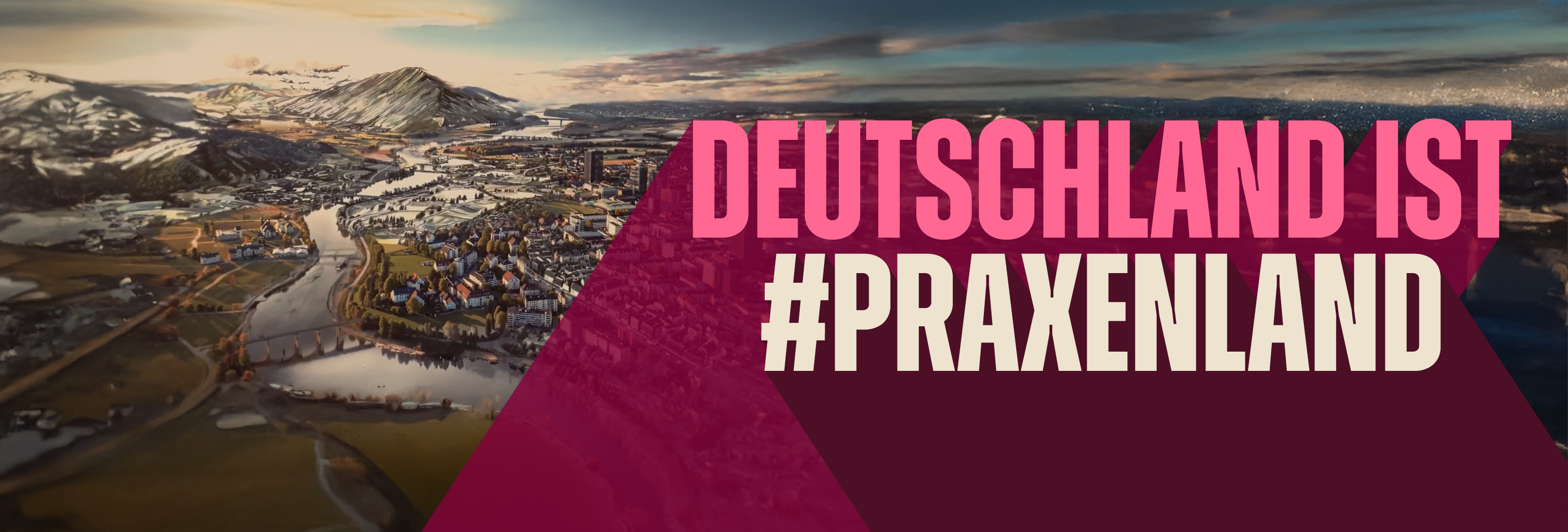 Motiv der KBV-Kampagne "#Praxenland" Landschaftsuafnahme in Vogelperspektive mit Stadt, Berg und Fluss